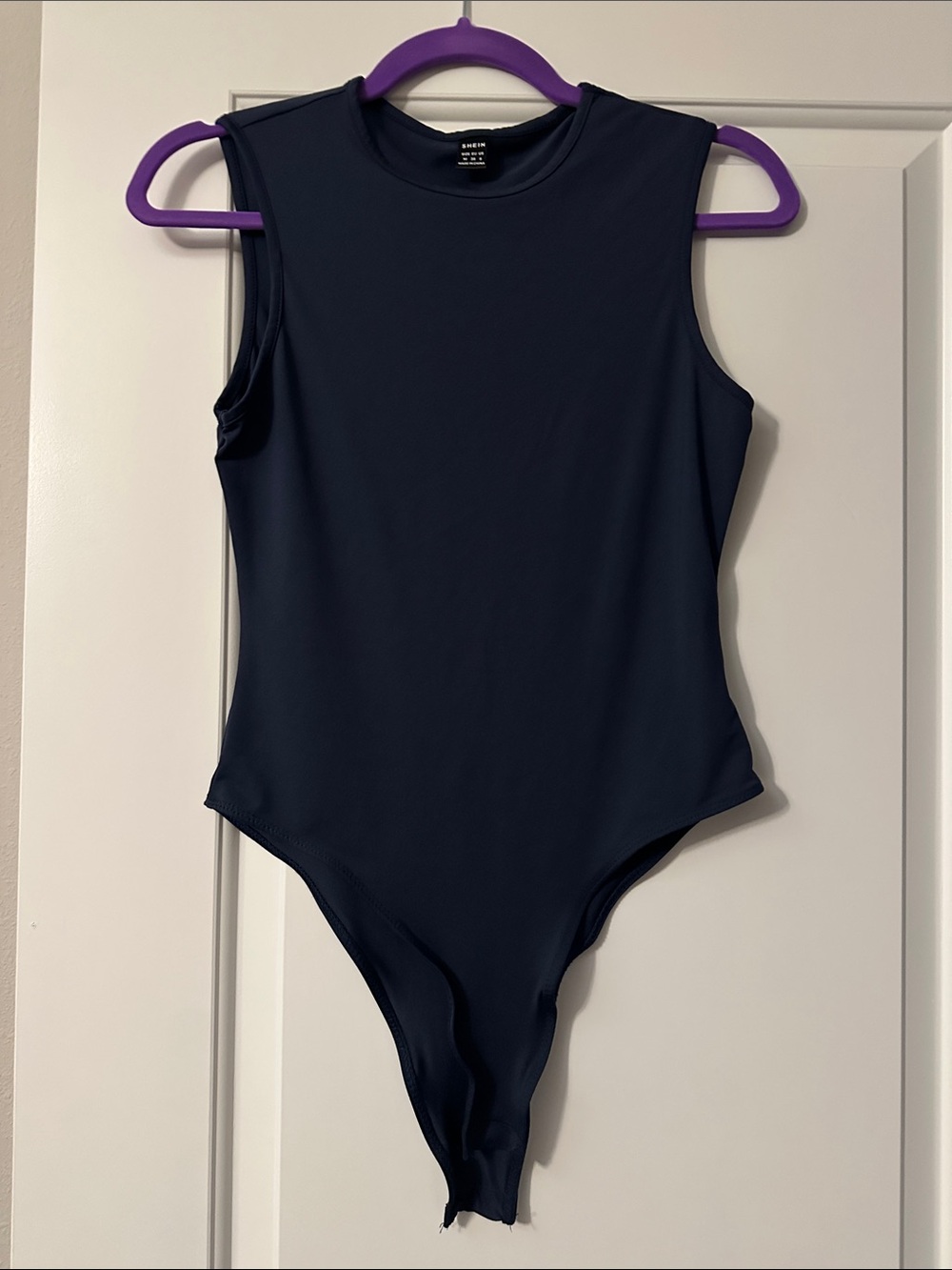 NWOT Navy Sleeveless One-Piece Bodysuit